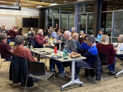 Club members socializing during the annual meeting