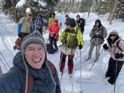 At another trail junction. Front: Steve Ghan. Second row: Tobe Hagge, Brett Lottes , Grace Chen. Third row: Tom Davis, Jeni Mickle, Marie Mortenson. Back row: Ellen Edwards, Ken Stoops, Jaynee Levy